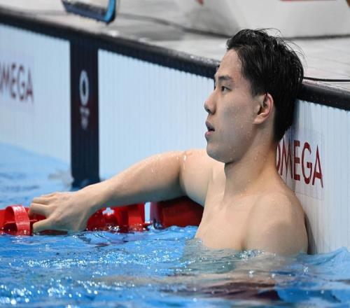 覃海洋男子100米蛙泳预赛58.35秒晋级，破日本选手保持的赛事纪录